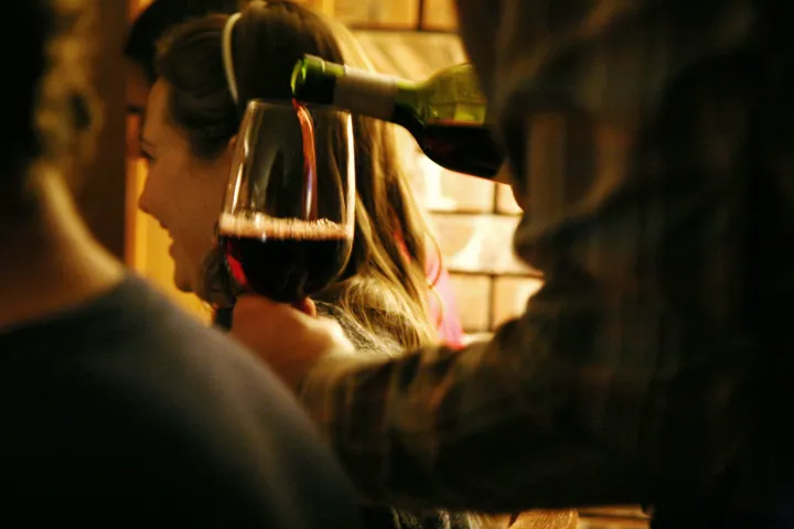 a close up of a person standing in front of a mirror