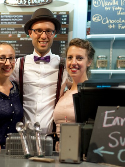 a person standing in front of a table