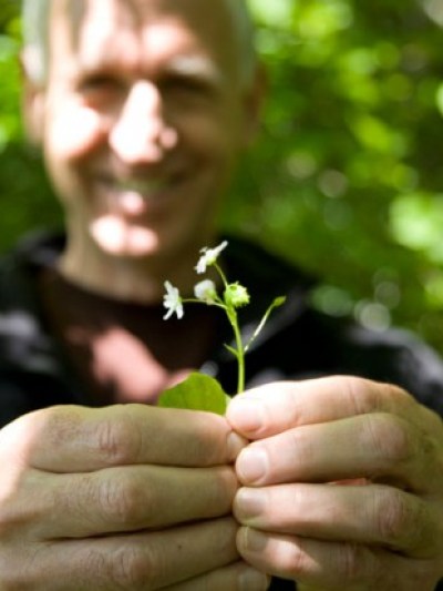 a person holding a flower