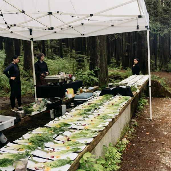a group of people standing on a bridge