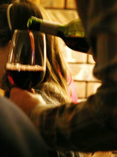 a man standing in front of a mirror