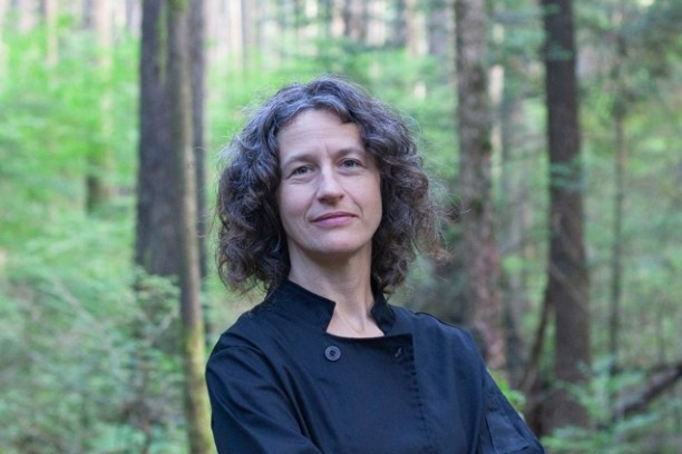 a person in a wooded area