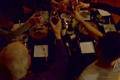 a group of people in a dark room