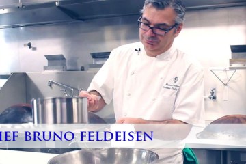Bruno Feldeisen cooking in a kitchen preparing food